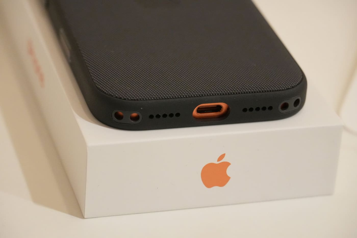 Technician repairing a phone charging port